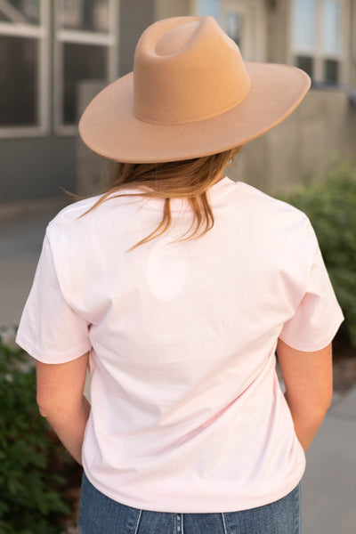 Back view of the world needs pink tee