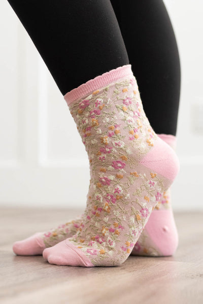 Side view of the pink floral socks