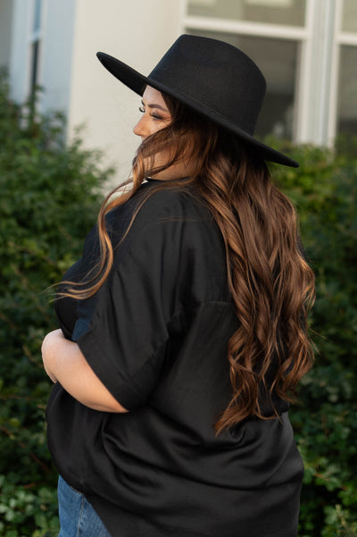 Side view of a plus size black top