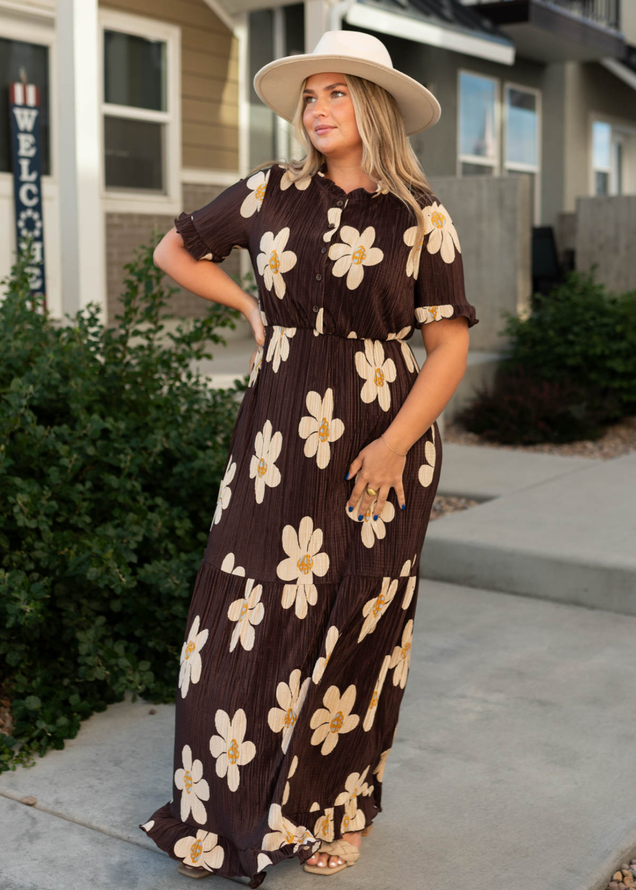 Long short sleeve brown floral dress with cream daisies