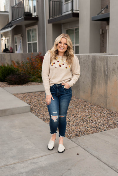 Long sleeve taupe sweater with embroidered flowers