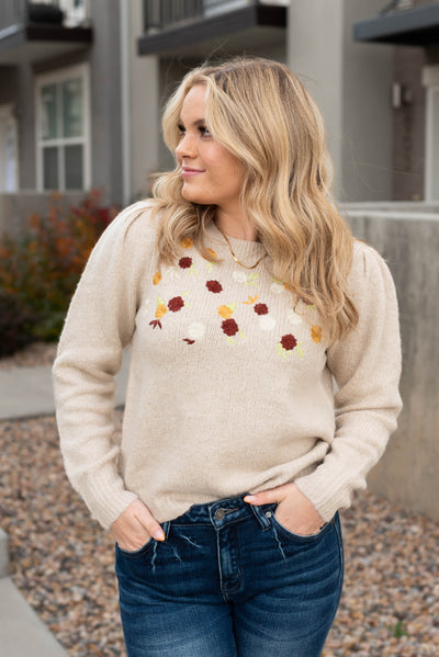Taupe sweater with embordered flowers