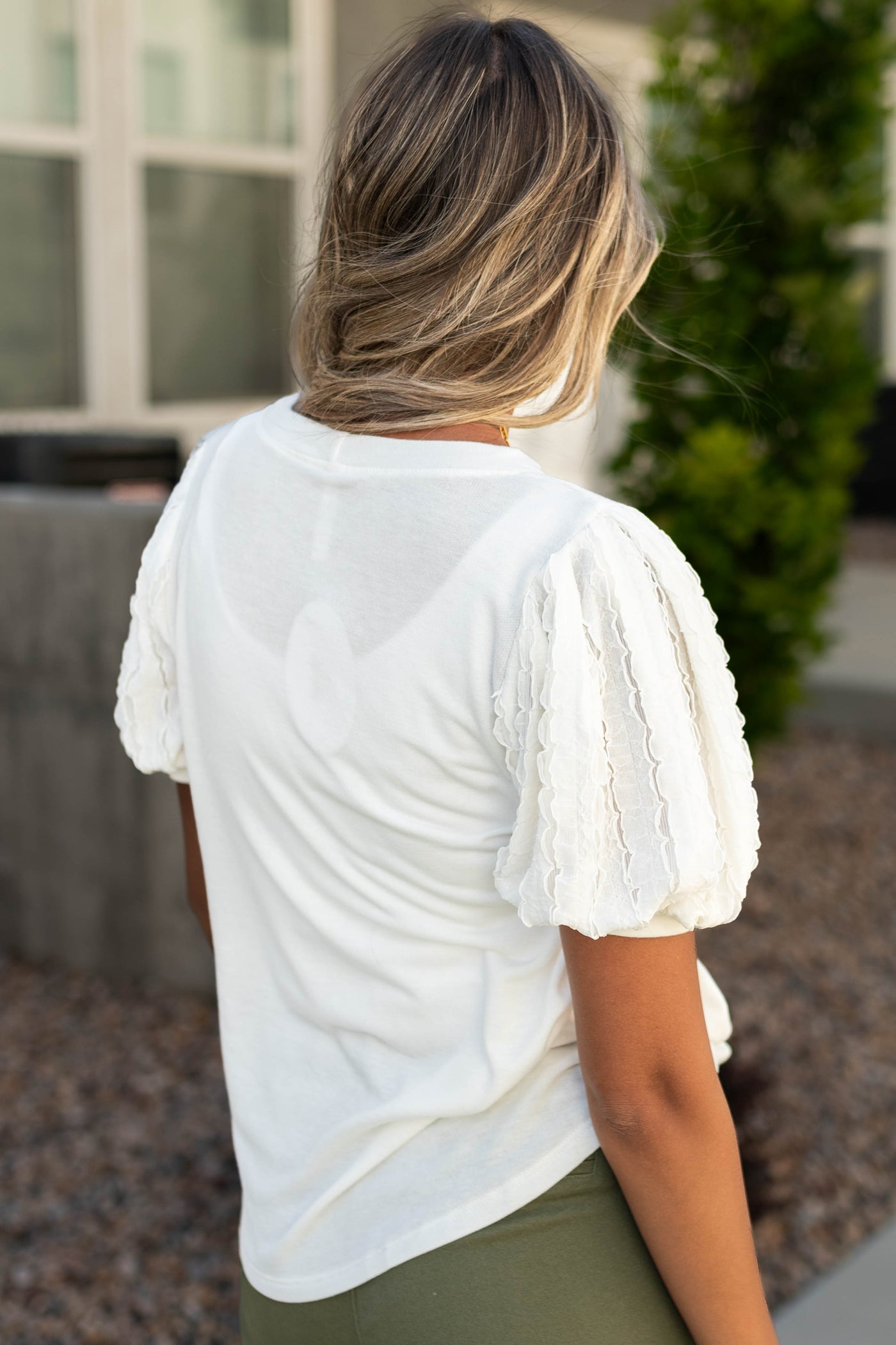 Back view of a white top