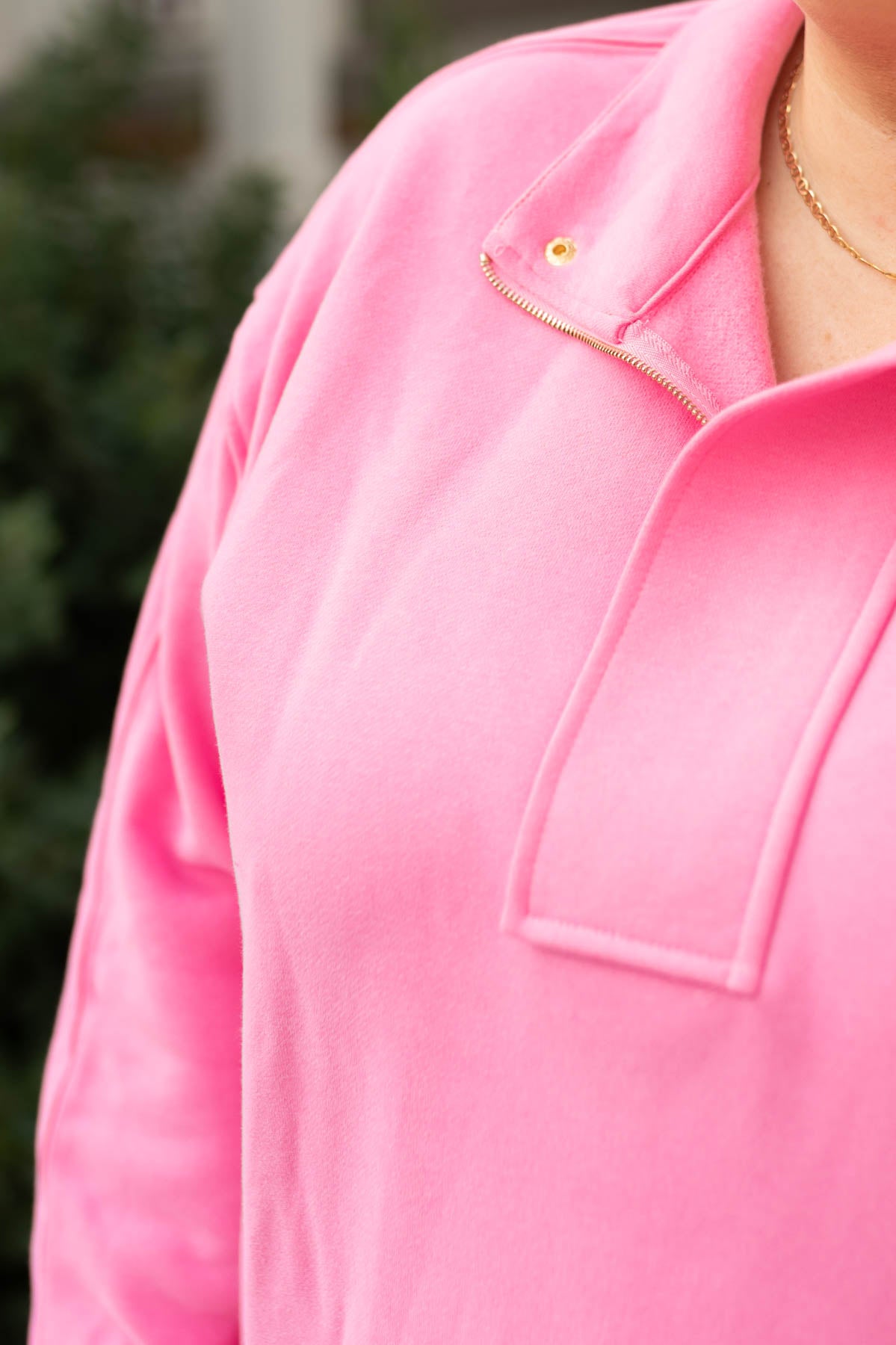 neck view of a pink pullover