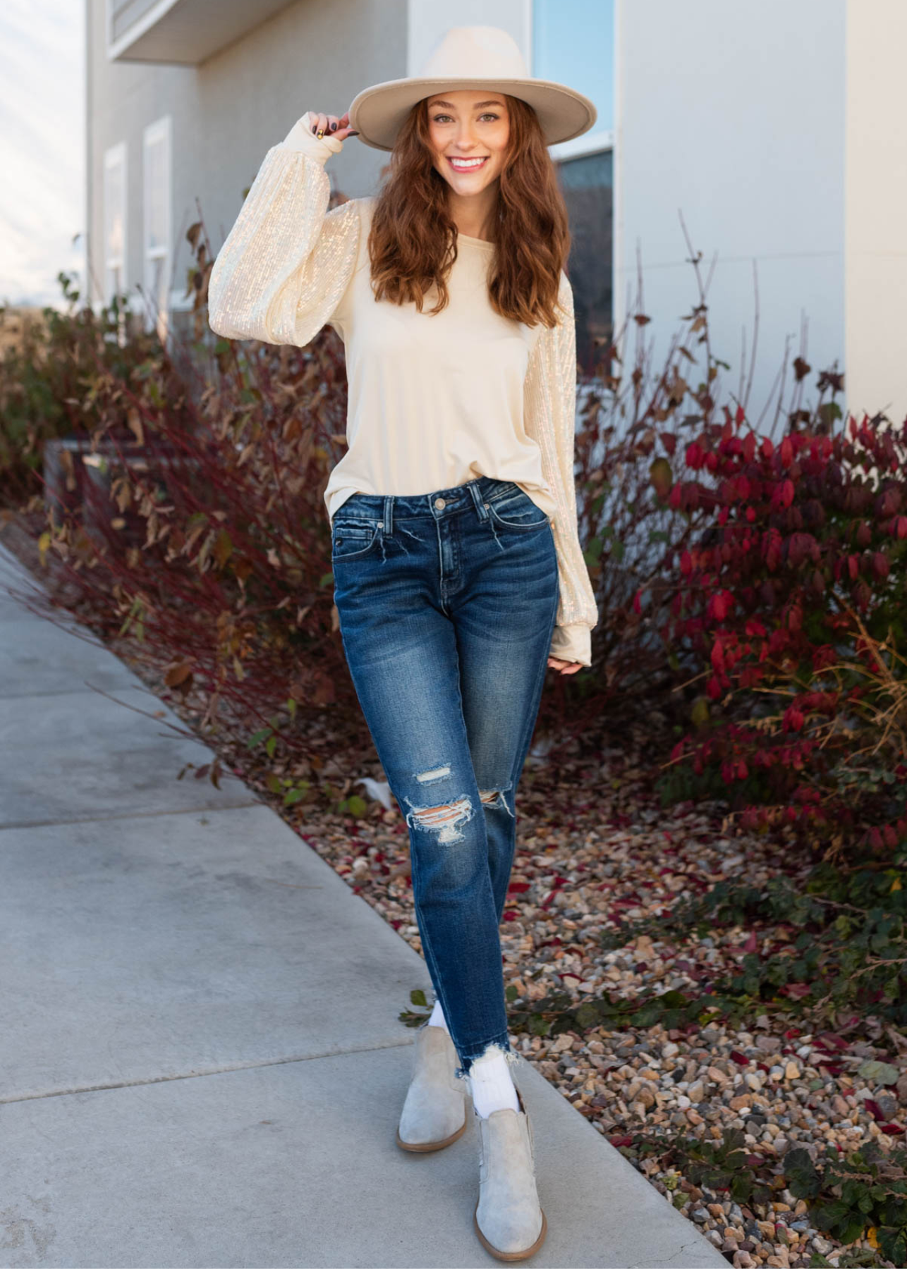Cream top with long sleeves
