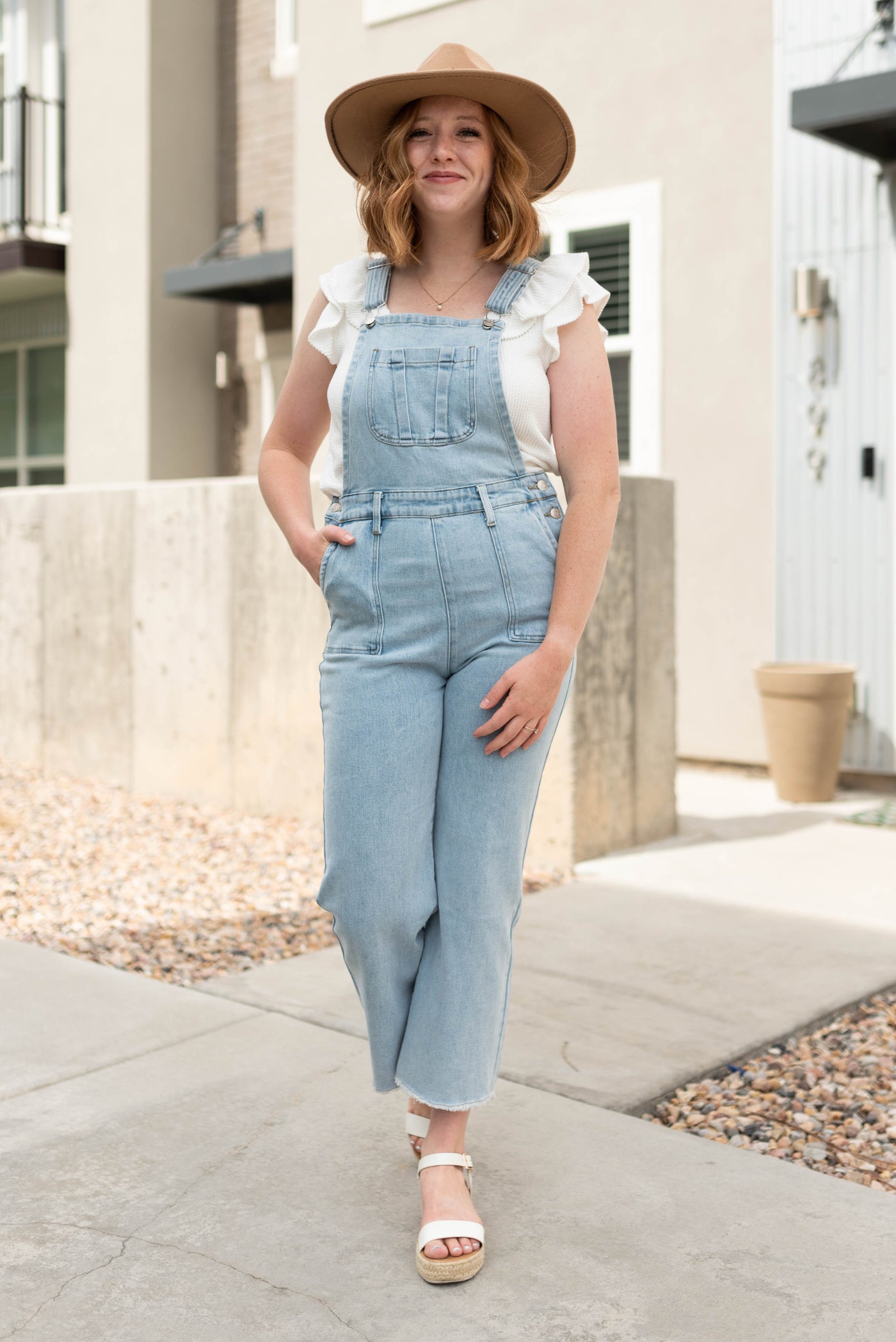 Front view of light denim overalls