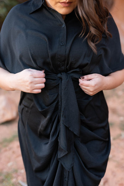 Plus size black dress with center gathering and bow