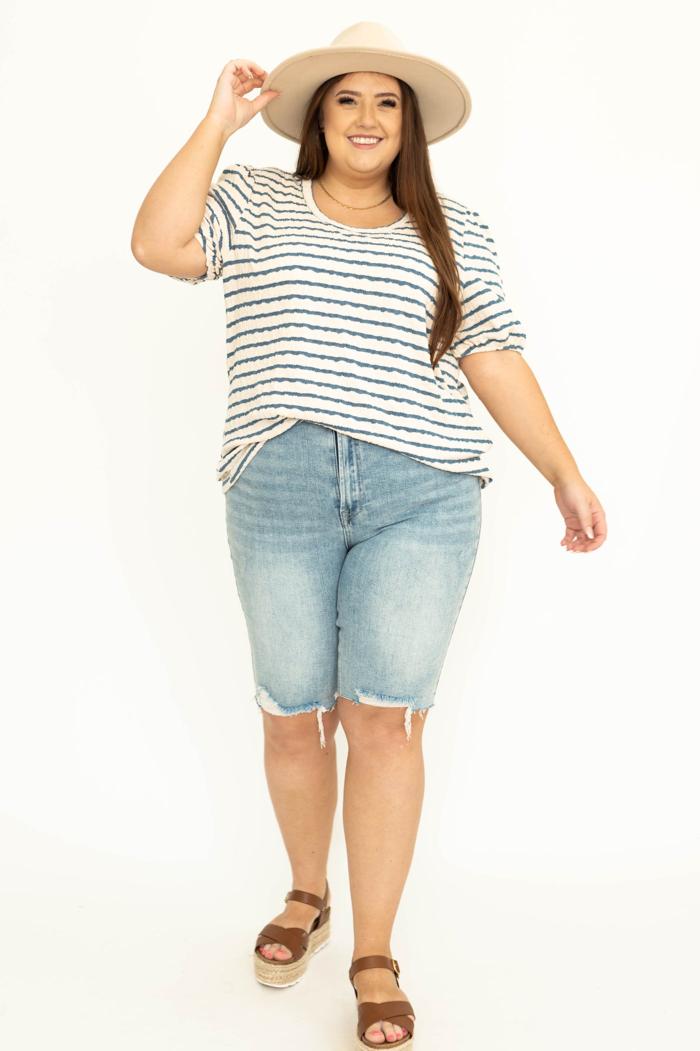 Plus size of a blue and cream striped top