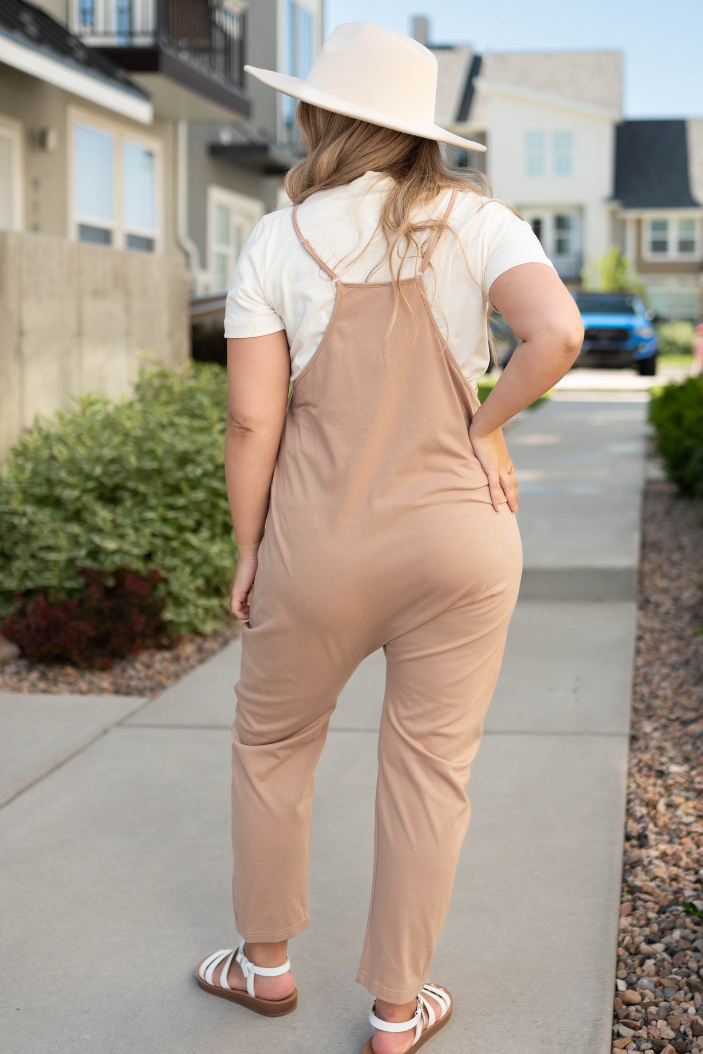Back view of a taupe jumpsuit