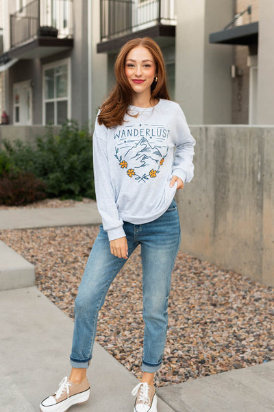 Wanderlust grey pullover with long sleeves and mountain graphics