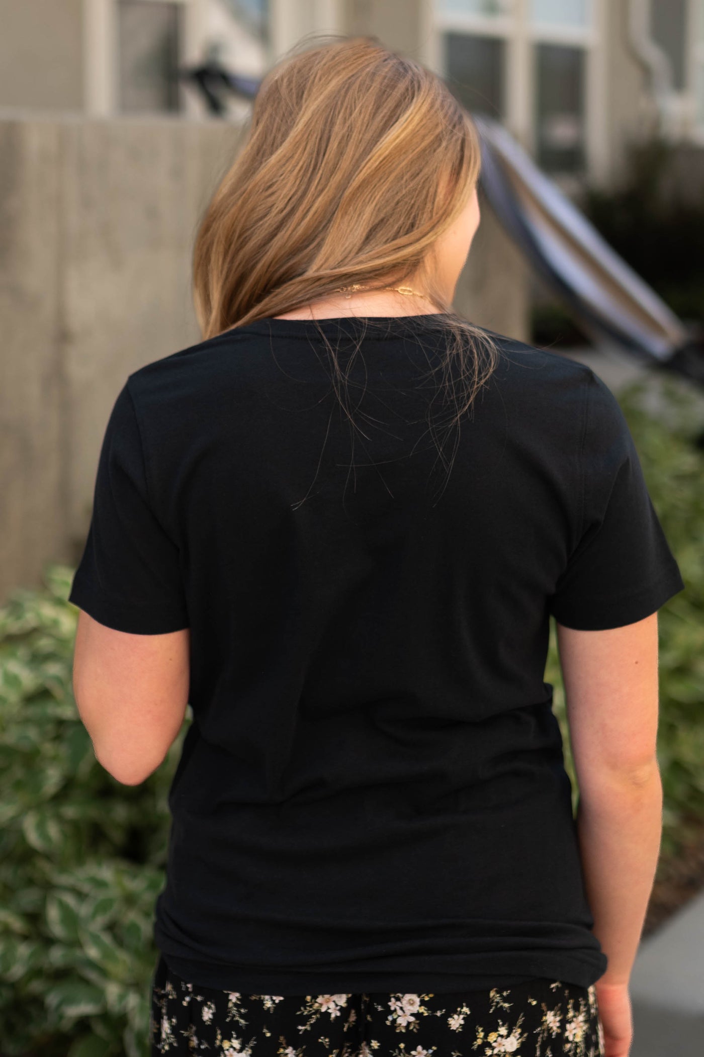 Back view of a y'all black tee