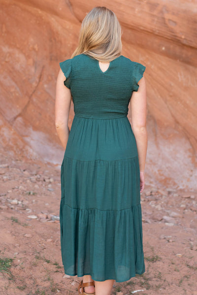 Back view of a hunter green dress
