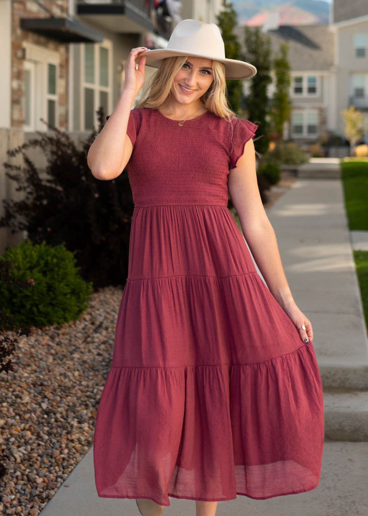Yours truly raspberry dress with a smocked bodice and tiered skirt