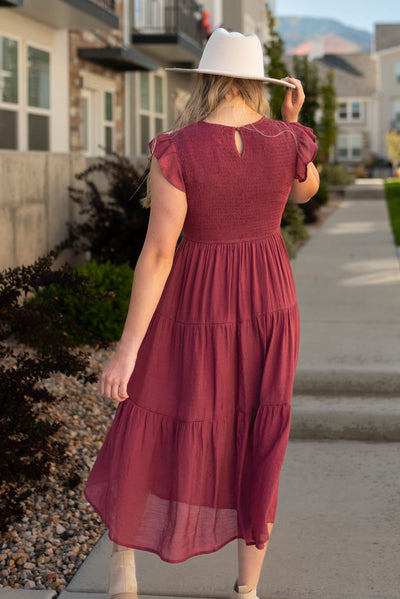 Back view of a raspberry dress