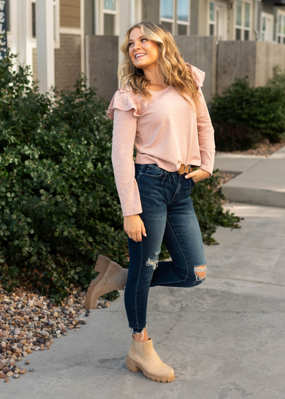 Mauve top with ruffle at the shoulder