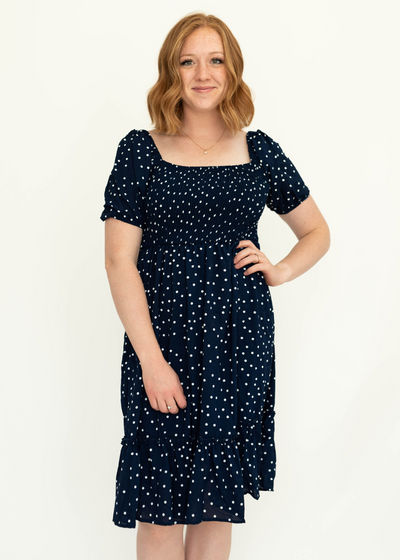 Navy dress with short sleeves, white dots and square neck