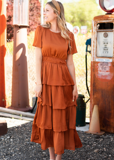 Rust ruffle dress