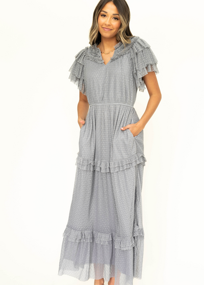 Blue gray lace short sleeve dress with ruffles on sleeves and neck.