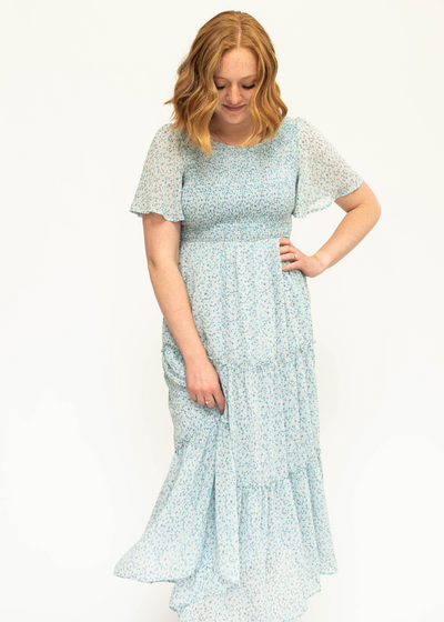 Blue Iris short sleeve floral dress with smocked bodice.