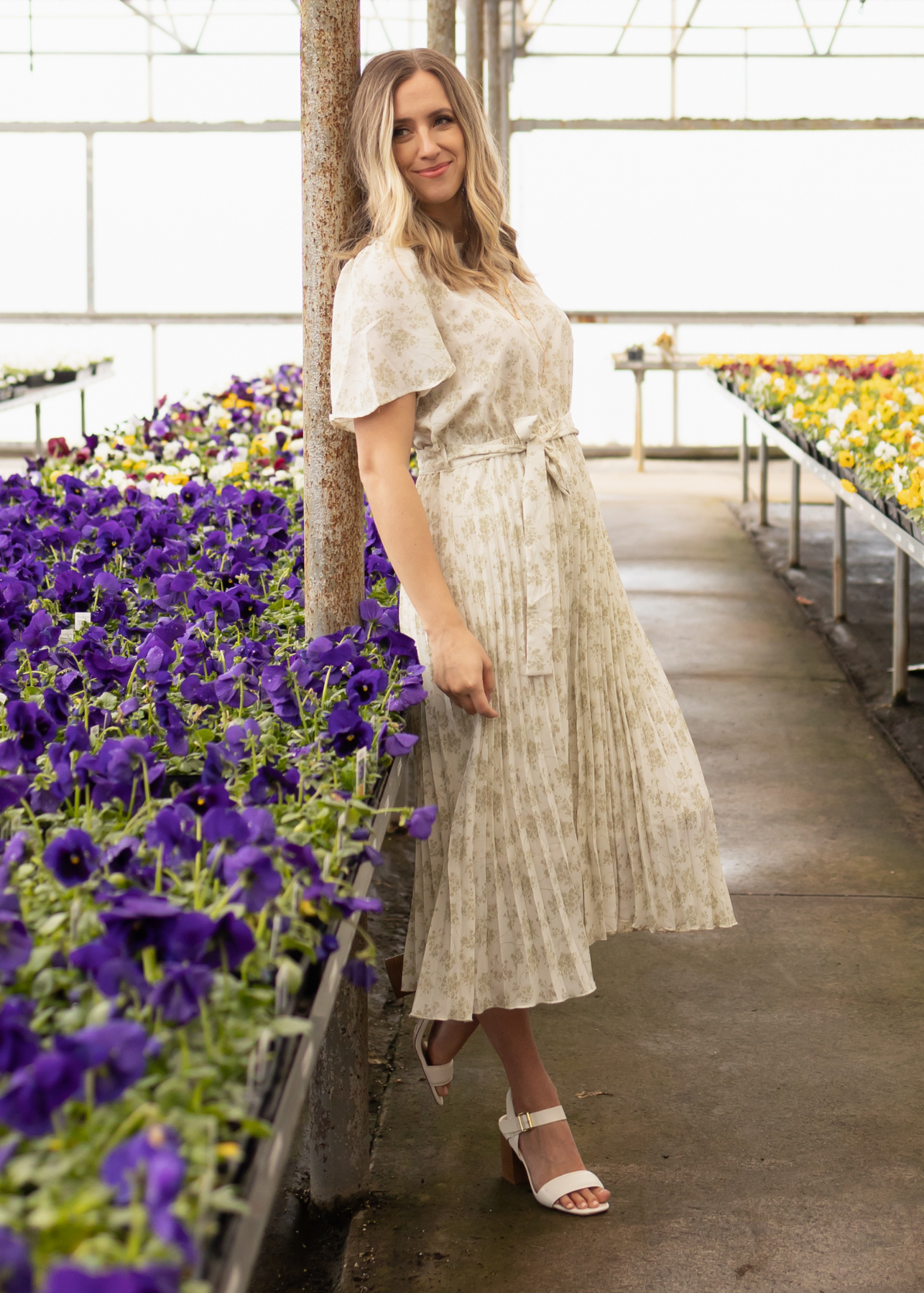 Side view of a sage floral dress