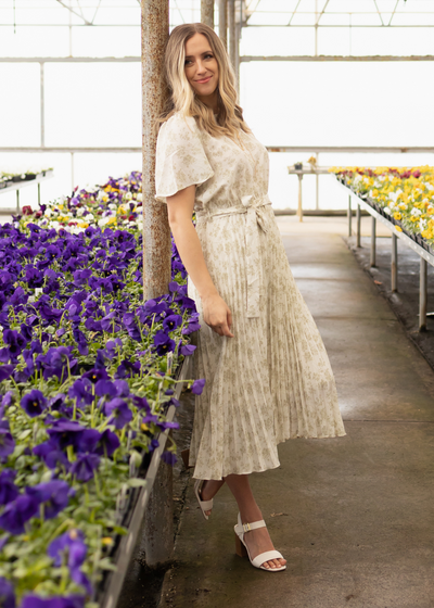 Side view of a sage floral dress