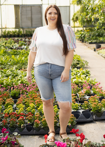 Plus size short sleeve white top with colorful sleeves