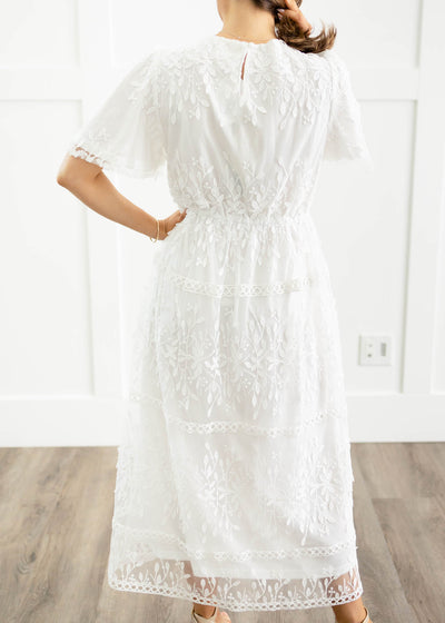 Back view of a white floral dress