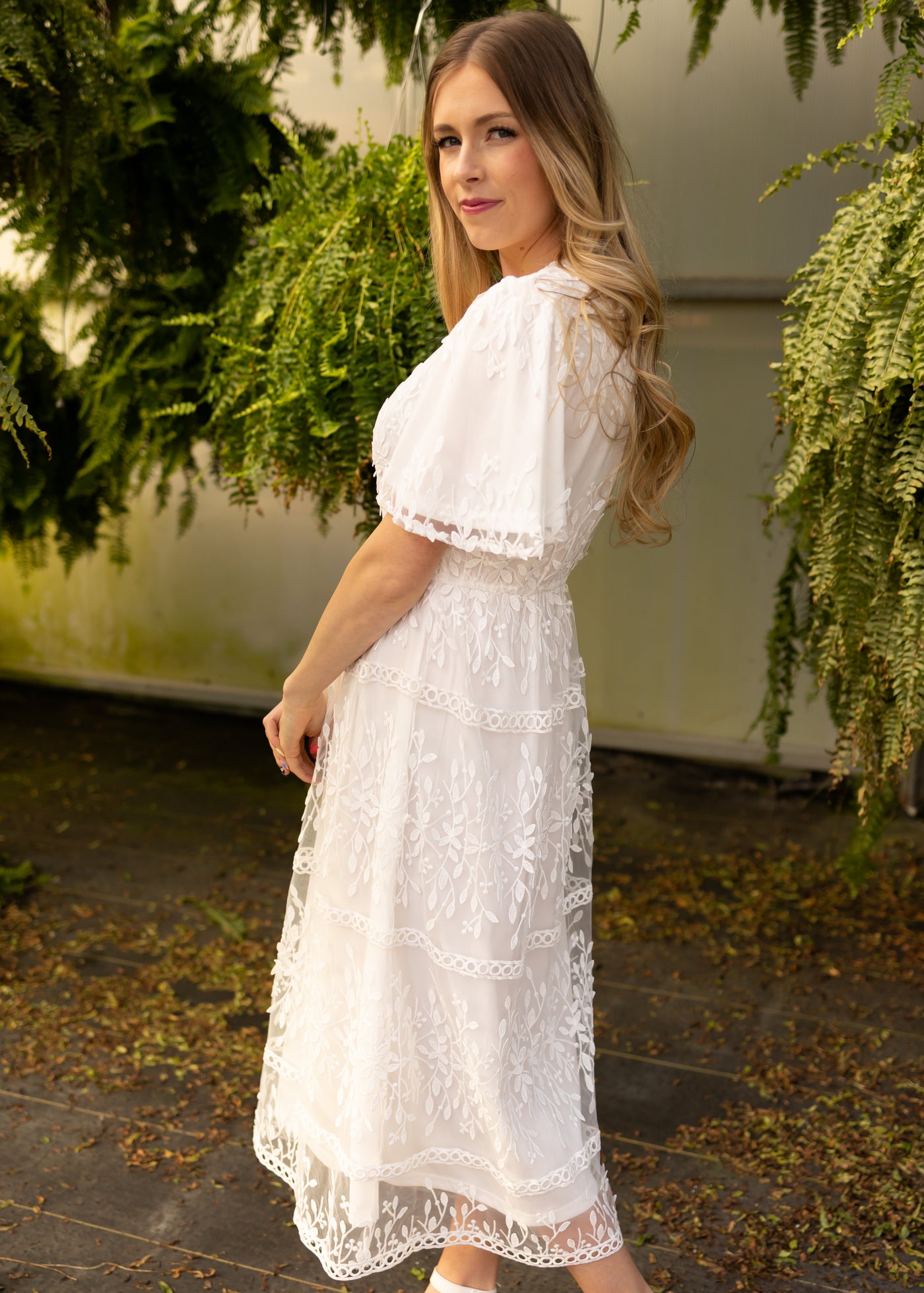 Side view of a white floral dress