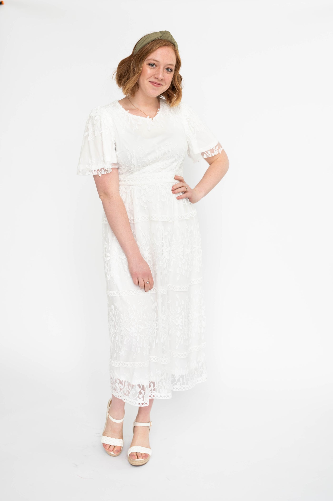 Lace white floral dress with a v-neck
