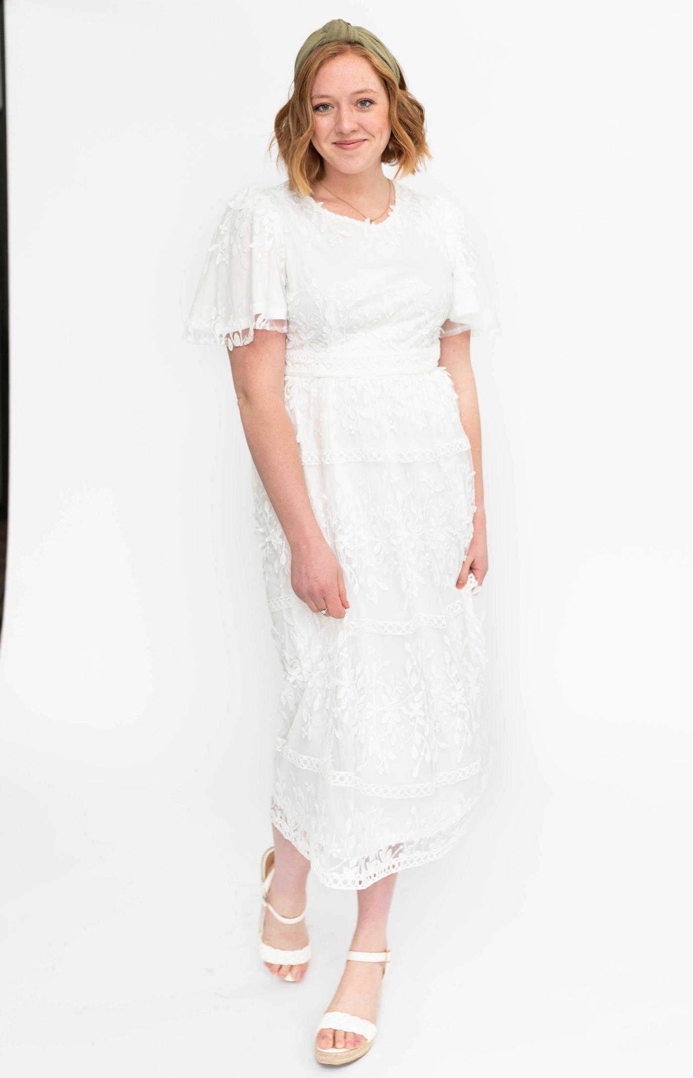 White floral dress with lace and short sleeves