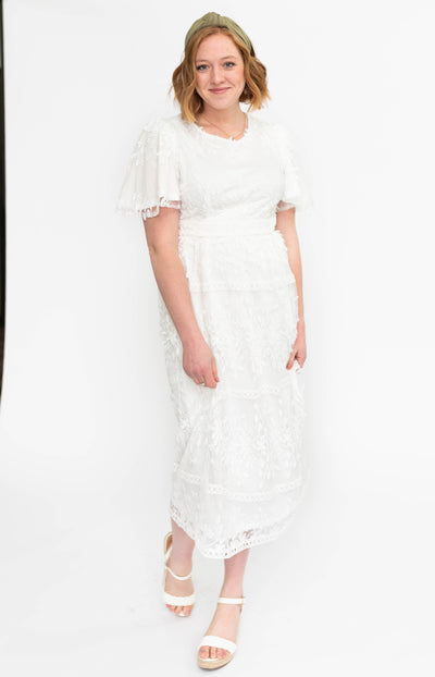 White floral dress with lace and short sleeves
