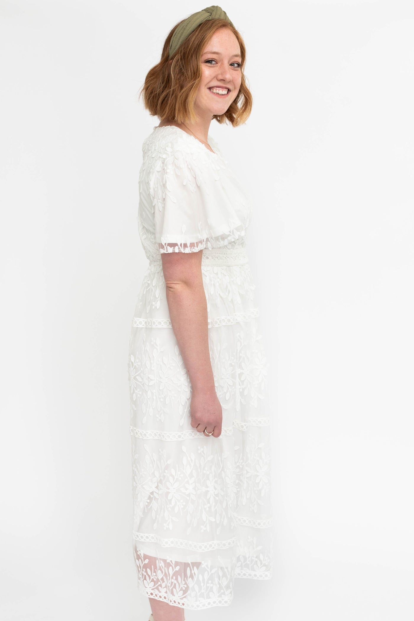 Side view of a white floral dress