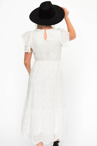 Back view of a white eyelet dress