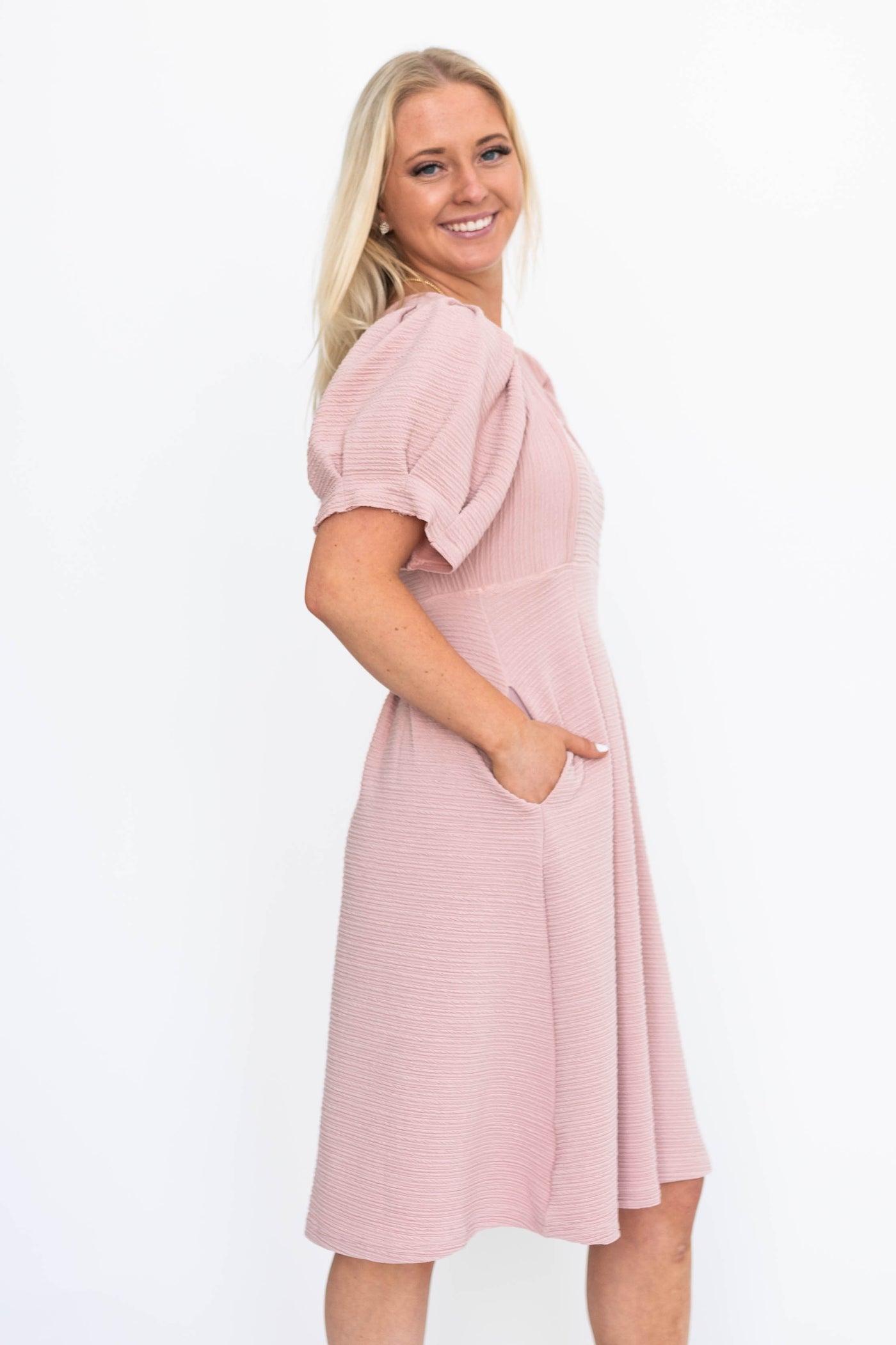 Side view of a dusty pink dress