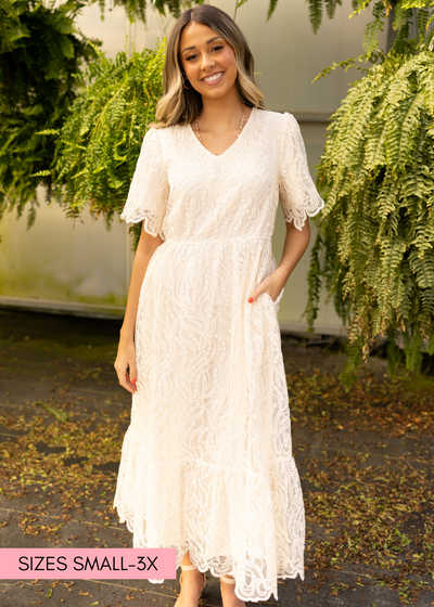 Short sleeve cream dress with a v-neck