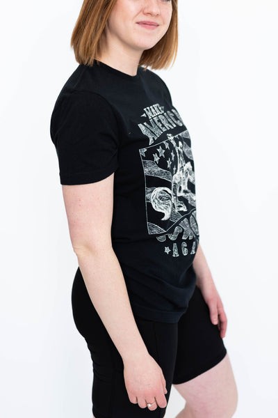 Side view of a cowboy black tee