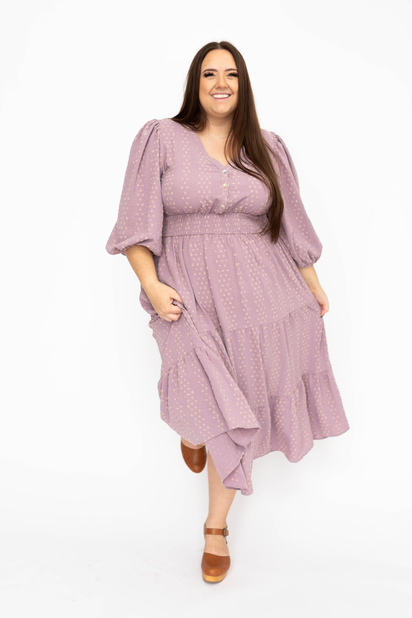 Plus size lavender dress with tiered skirt and 3/4 sleeve