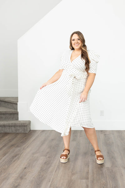Short sleeve plus size white dot dress with a tie at the waist