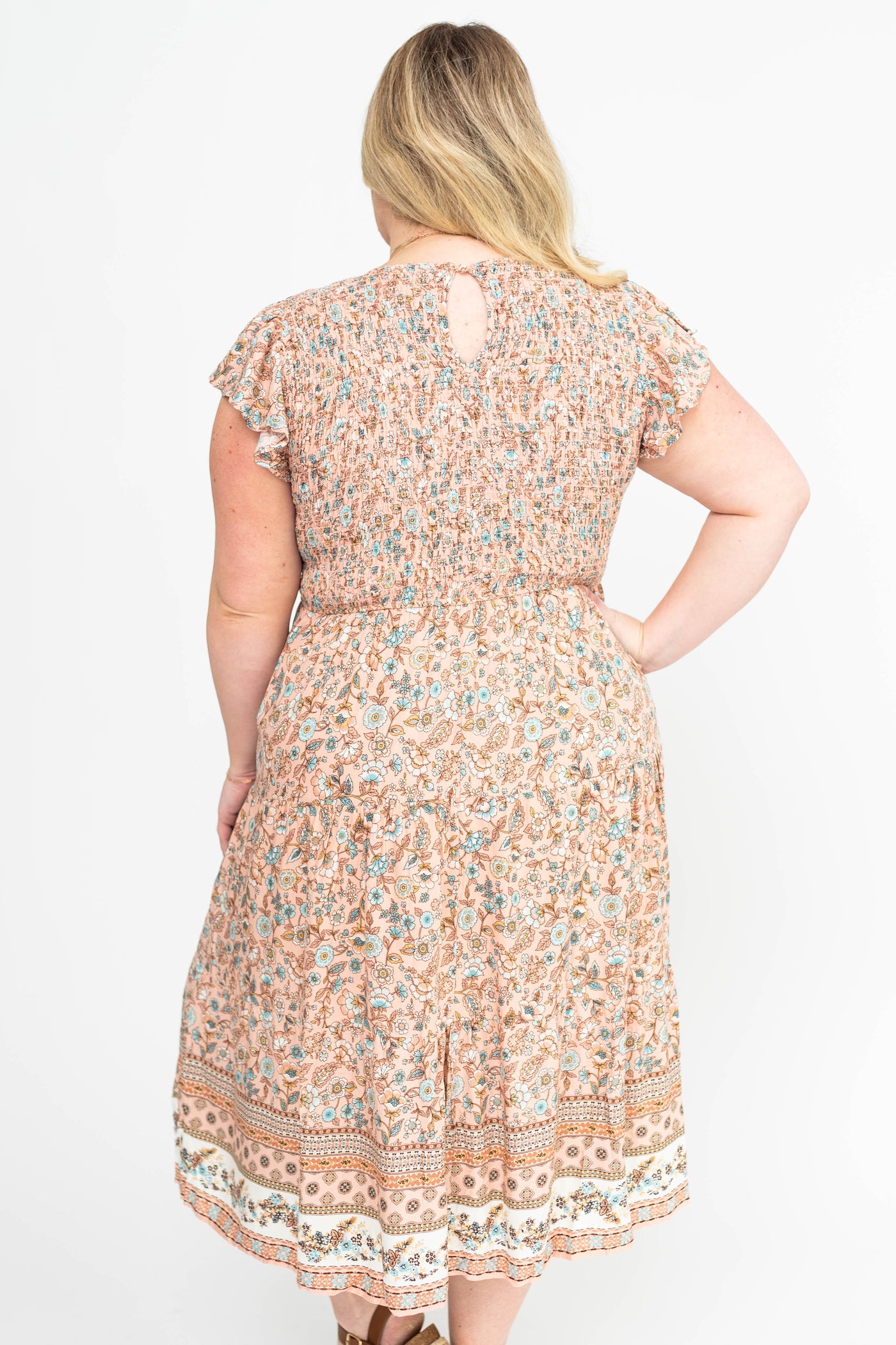 Back view of a peach dress