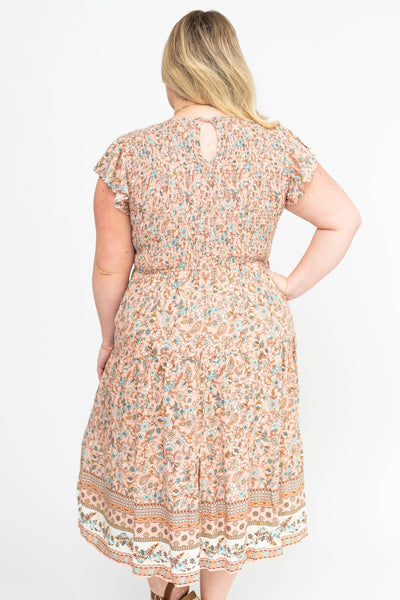 Back view of a peach dress