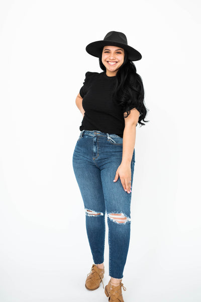 Short gathered sleeve on a large black top