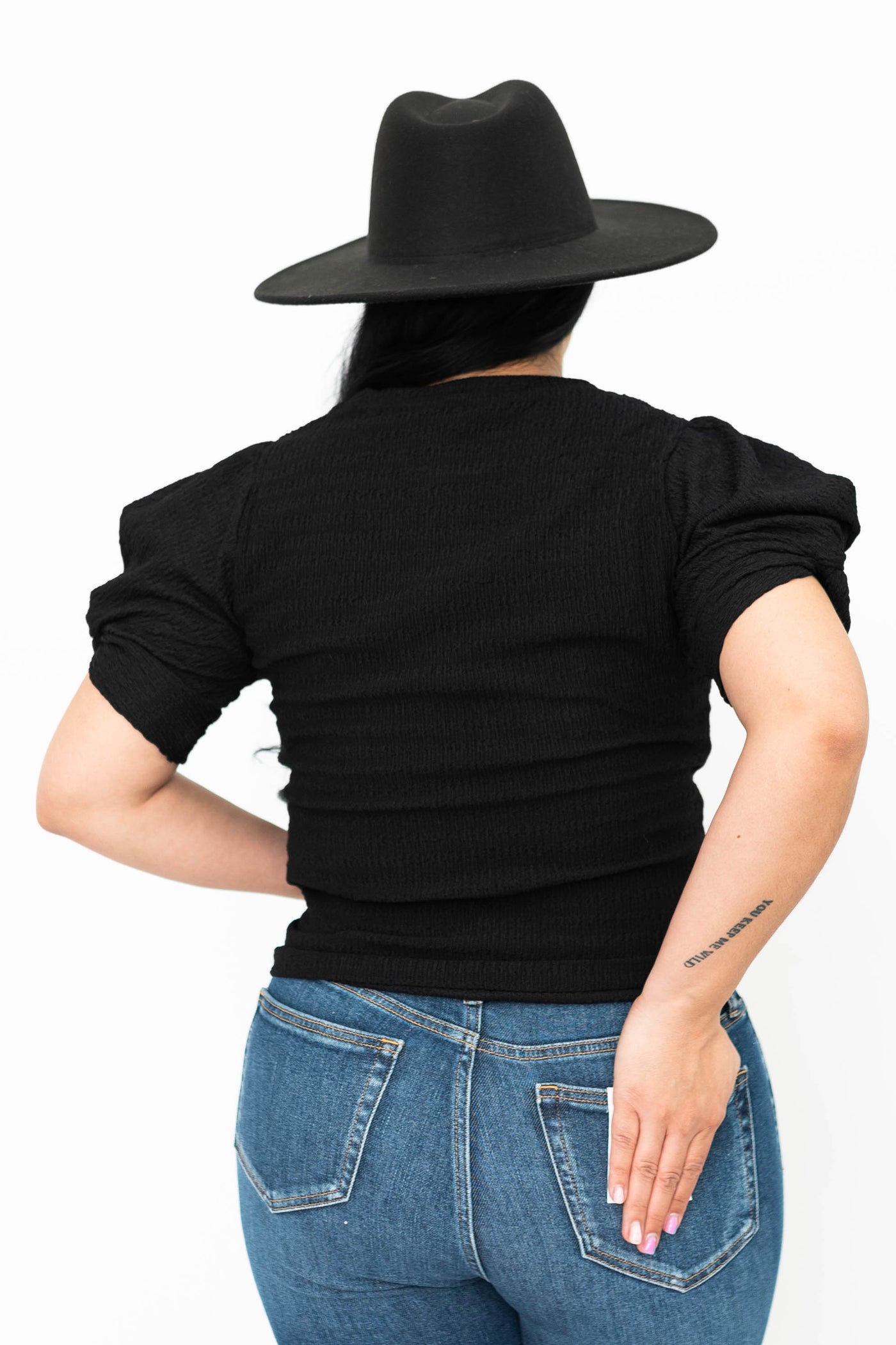 Back view of a large black top