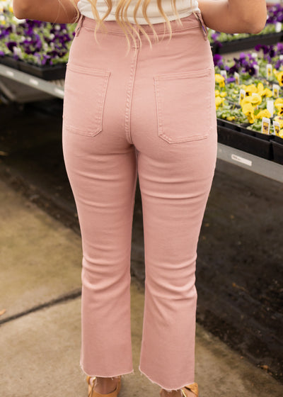 Back view of mauve jeans with back pockets