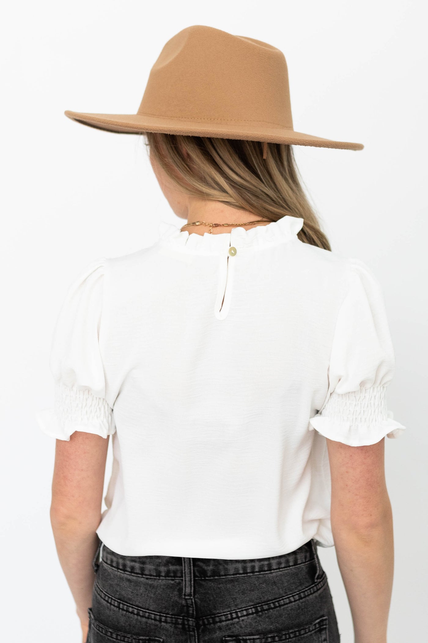 Back view of a Brenda white top