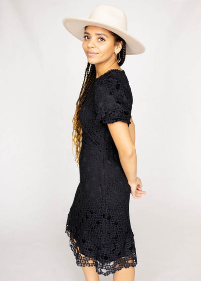 Side view of a black lace dress