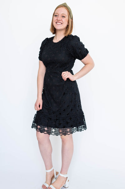 Knee length black lace dress