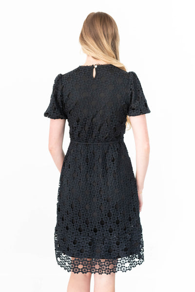 Back view of a black lace dress