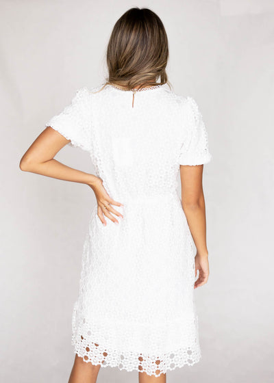 Back view of a white lace dress