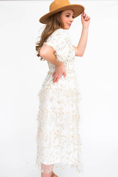 Side view of a white floral dress