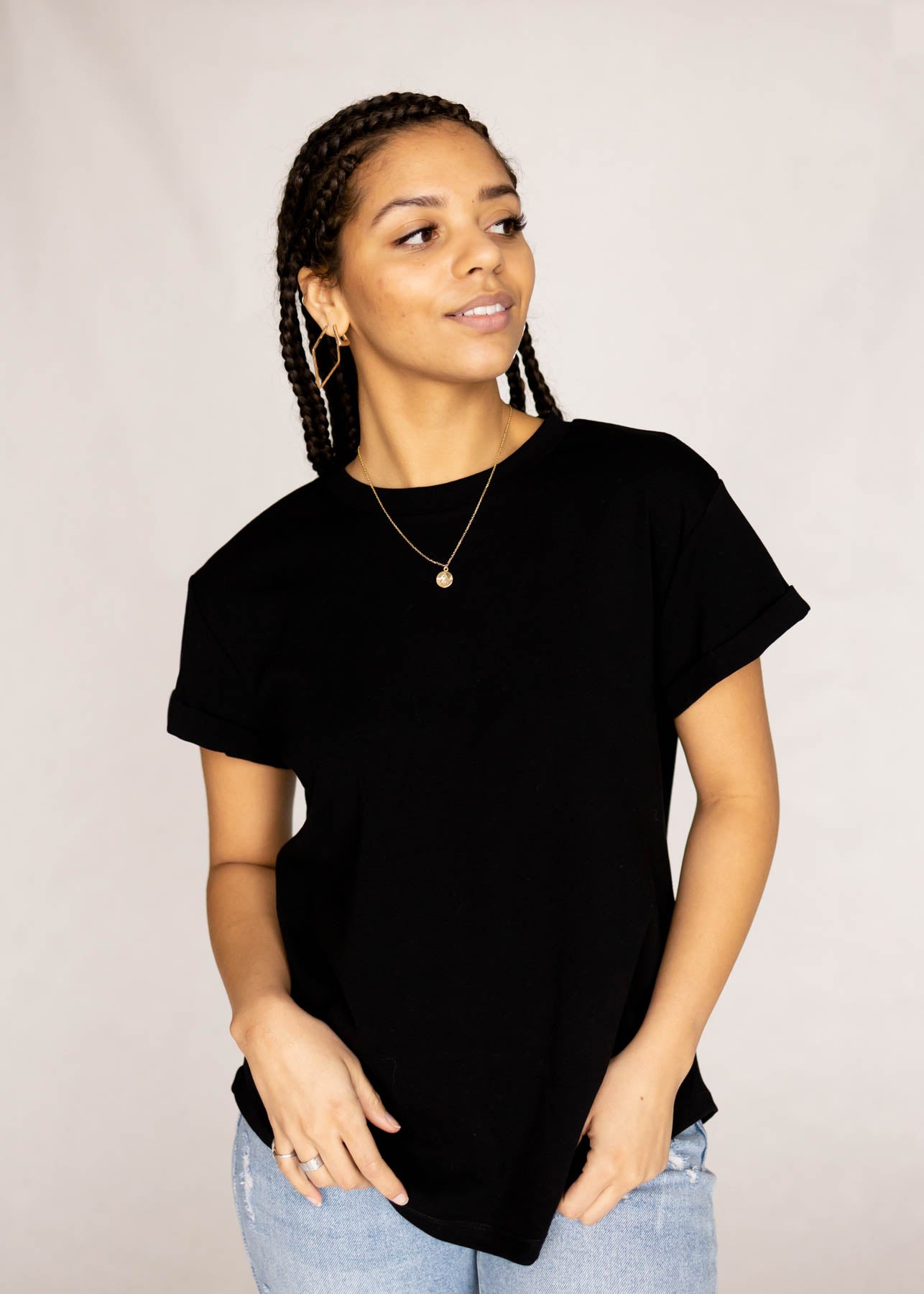 Rolled cuff short sleeve black top